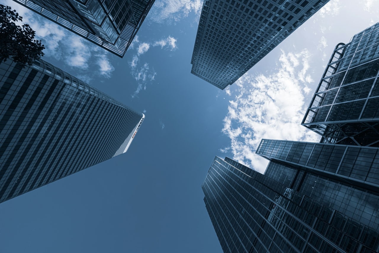 Looking up between the towers at Canary Wharf in London