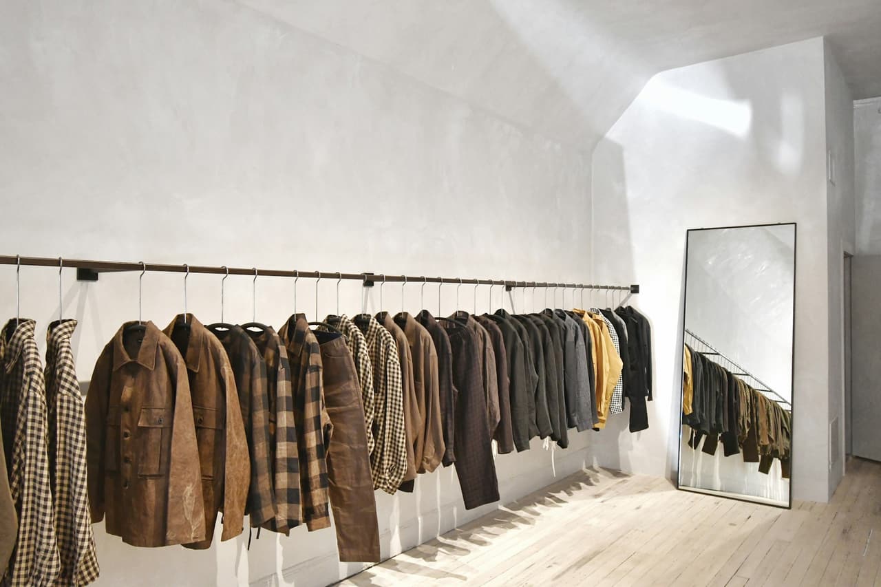 A rail of menswear inside a London boutique