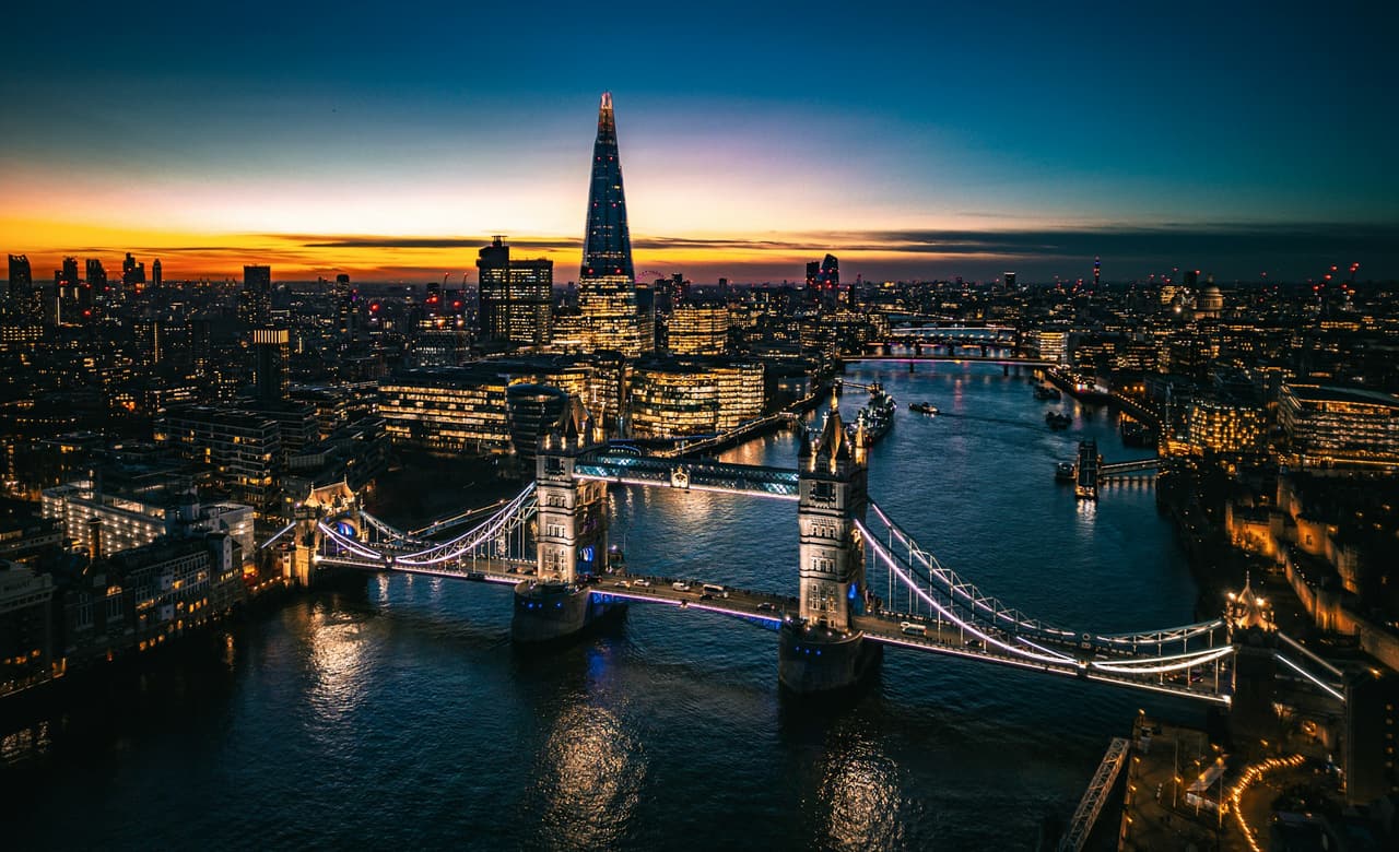 Aerial view of the City of London skyline at night