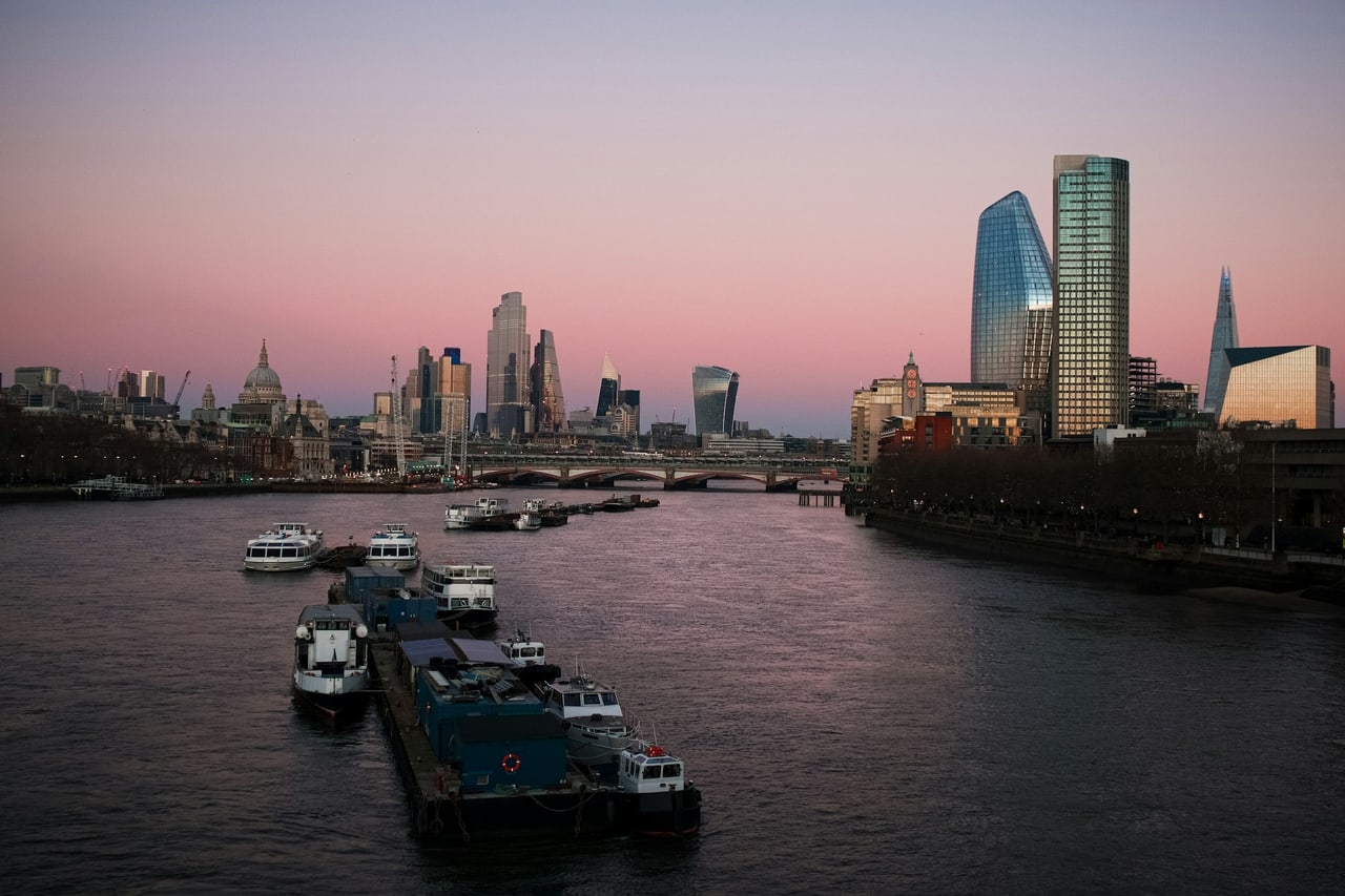The London skyline at dusk from the river